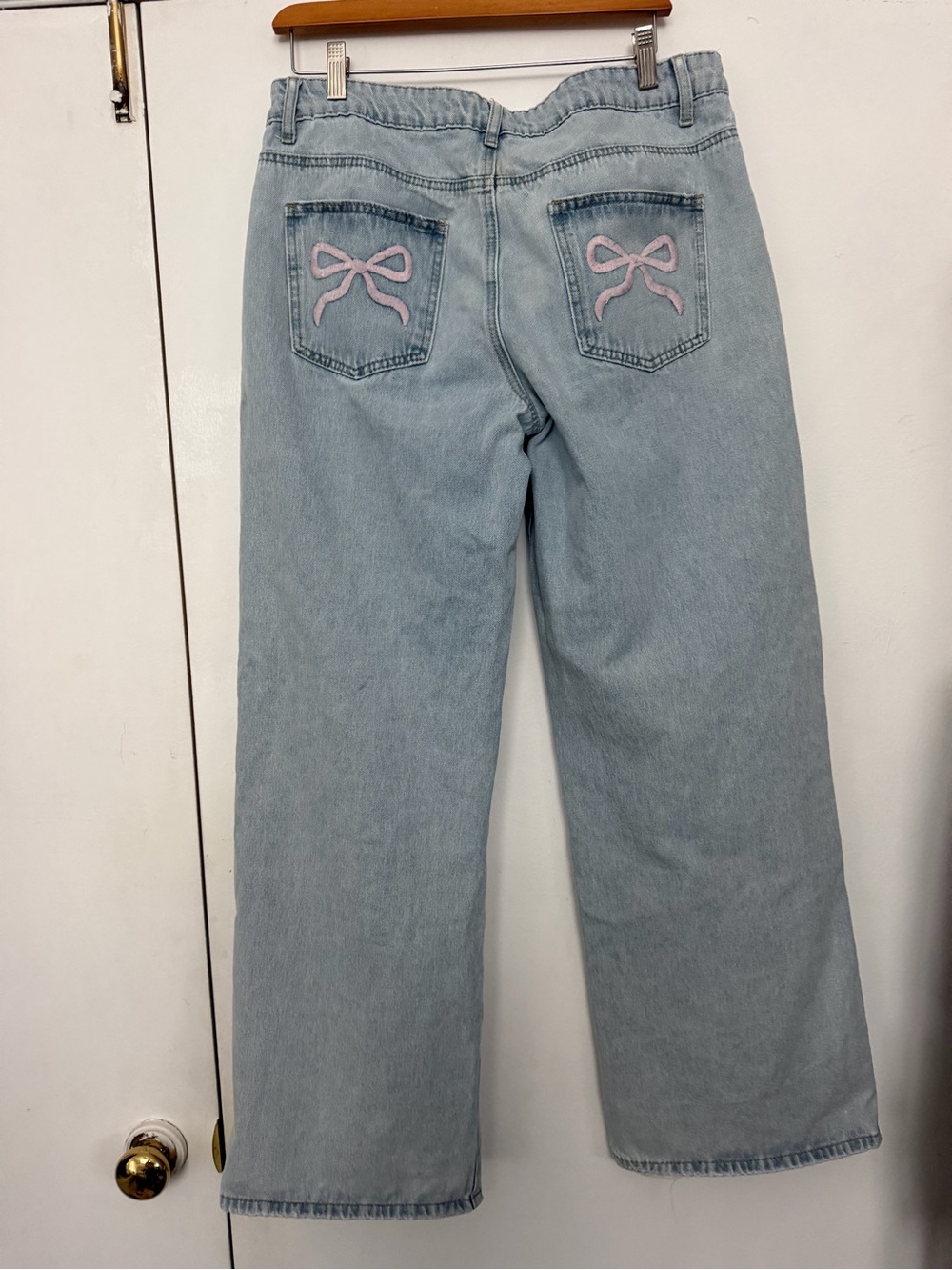 Light Blue Wide-Leg Jeans with Pink Bow Pockets